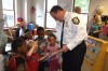 Albany Police Chief Steve Krokoff reads to children at Joseph L. Bruno Family Resource Center in Troy